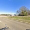 Deer carcass creating road hazard near auto shop