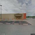 Person with medical emergency in green semi truck at Walmart