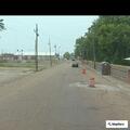 Vehicle windshield damaged near railroad crossing
