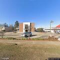 Officer stops Ford pickup at Louisiana National Bank