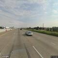 Vehicle with flat tire blocking lane on I-35E