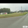 Suspicious pickup with unreadable tag on trailer