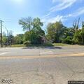 Burglar alarm at rear door on West Grand