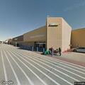 Caller reports person in mask at Walmart lot