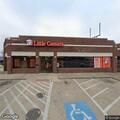 Group of men arguing behind Little Caesars