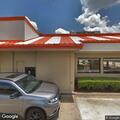 Parking violation involving red Cadillac at Whataburger