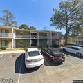 Women arguing outside Lake Vista Apartments