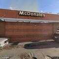 Welfare check for man asleep in red truck at building