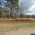Grass fire near home with residents evacuating
