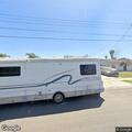 Disabled 36-foot motorhome blocking right lane