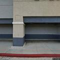 Person experiencing chest pain in store parking lot