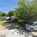 Cat stuck under car at Horseshoe Trail home