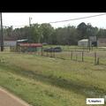 Vehicle in ditch on Highway 1 near I-49