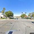 Young woman vomiting blood at bus stop in La Mesa