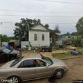 Person repeatedly passing out at home behind dogs