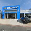 Man seen trying to open car doors at dealership