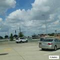 Traffic stop on black Kia Forte at McDonald’s