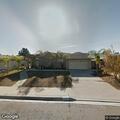 Person experiencing abdominal pain in Santee