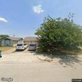 Two men seen looking into home windows