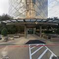 Person pulling on door in parking garage