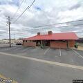 Person unresponsive sitting outside Lanett laundromat