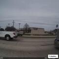 Person with injured finger at roadside dealership