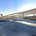 Person standing in freeway median creating hazard