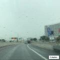 Occupied stolen BMW sedan in highway traffic