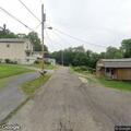 Person reported looking through mailboxes on Wooster Road