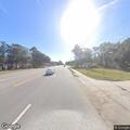 Traffic stop on silver Chevy Malibu
