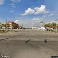 Abandoned trailer partially blocking roadway