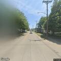 Homeless camp fire near railroad tracks in Dayton