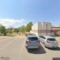 Woman yelling at bus stop on South Walnut Street