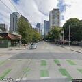 Woman throwing chairs at Bell Street corner
