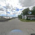 Backpack reported in roadway on Poplar Street