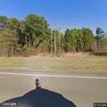 18-wheeler crashes off US 59 into woods