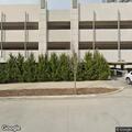 Officer checks vehicle at parking garage