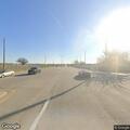 Traffic stop on black Cadillac in Frisco lot