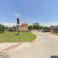 Pedestrian hit by vehicle in front of auto shop