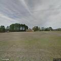 Grass fire in field near Columbia Road residence