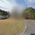 Vehicle taking photos outside home on Saddlebrook Way