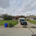 Person repeatedly in yard and at front door