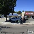 Person assisted after fall at apartment parking lot