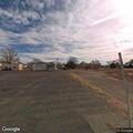 Female found face down in parking lot near S Sunset Ave