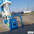 Large oil spill of red dye near air pumps