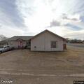 Person peeking in apartment window in Slaton