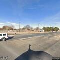 Person lying in sun under overpass on Highway 84 frontage