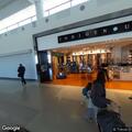 Person having heart problem at airport terminal