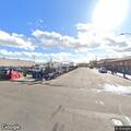 Person with back problem at 12th Avenue and Madison Street
