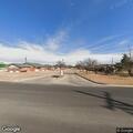 Man knocking on apartment doors in Slaton